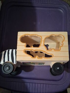 Melissa & Doug Wooden Animal Shape Sorter Truck in Natural and Black